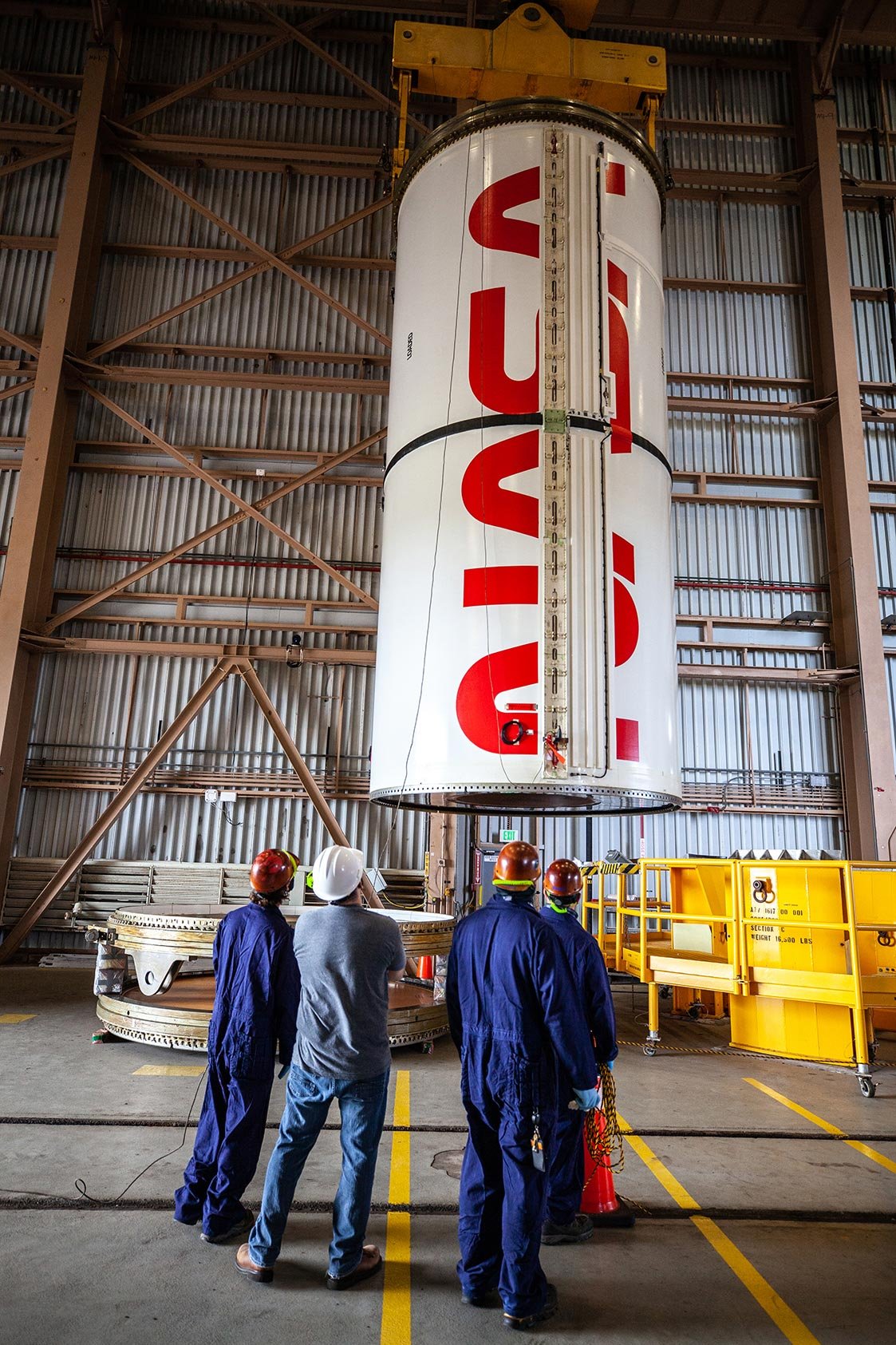The NASA logotype, or “worm” logo, is seen on a booster segment of the Space Launch System rocket that will fly on Artemis I